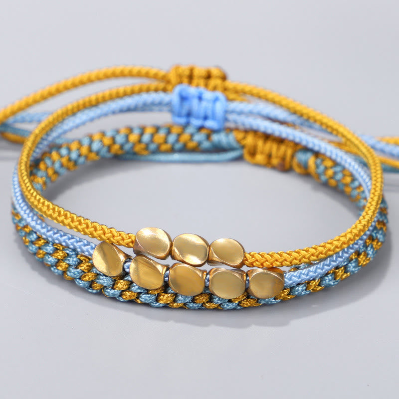 Buddha Stones Bracelet de guérison composé de 3 perles bleues, jaunes et dorées en cuivre, avec cordon et cordon. - Cordon (Tour de poignet : 16-26 cm) - image 0