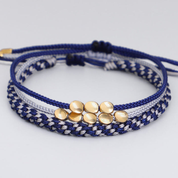 Buddha Stones Bracelet de soin personnel composé de 3 perles bleues, grises et dorées en cuivre, fil filé bleu-gris - Cordon (Tour de poignet : 16-26 cm) - image 0