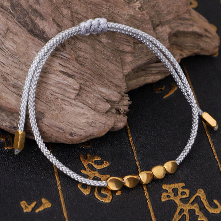 Buddha Stones Bracelet de soin personnel composé de 3 perles bleues, grises et dorées en cuivre, fil filé bleu-gris - image 3