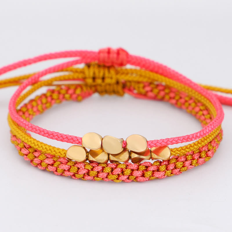 Buddha Stones Bracelet de richesse composé de 3 perles roses, jaunes et dorées en cuivre. - image 1