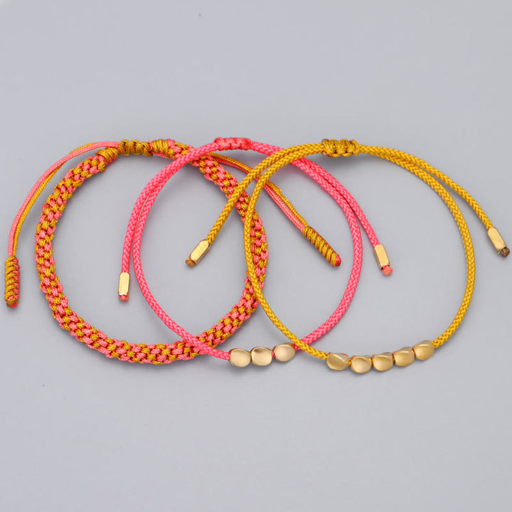 Buddha Stones Bracelet de richesse composé de 3 perles roses, jaunes et dorées en cuivre. - image 8