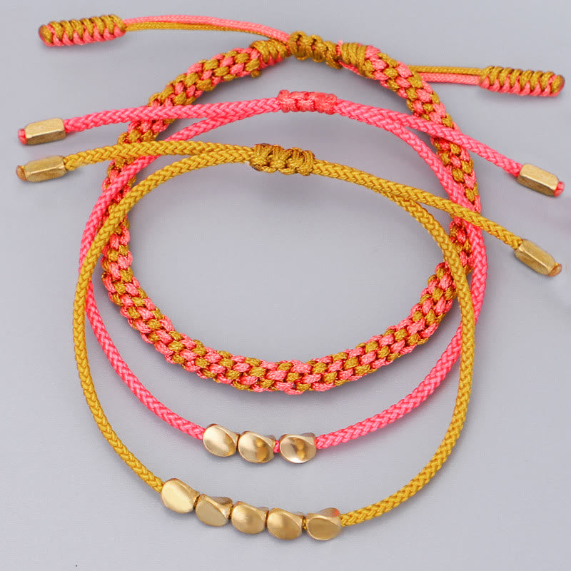 Buddha Stones Bracelet de richesse composé de 3 perles roses, jaunes et dorées en cuivre. - image 2