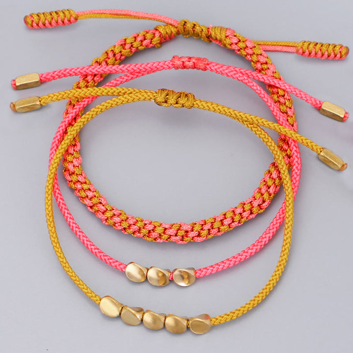 Buddha Stones Bracelet de richesse composé de 3 perles roses, jaunes et dorées en cuivre. - image 2