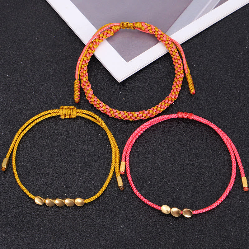 Buddha Stones Bracelet de richesse composé de 3 perles roses, jaunes et dorées en cuivre. - image 9