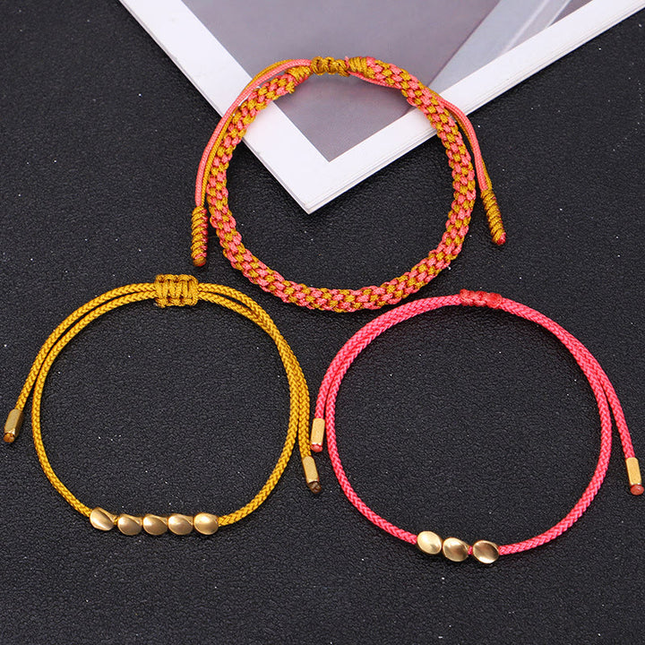 Buddha Stones Bracelet de richesse composé de 3 perles roses, jaunes et dorées en cuivre. - image 9