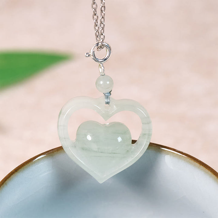 Buddha Stones Pendentif collier en jade en forme de cœur creux, symbole d'abondance et d'amour - Argent - Jade naturel (la couleur et la taille peuvent varier) - image 7