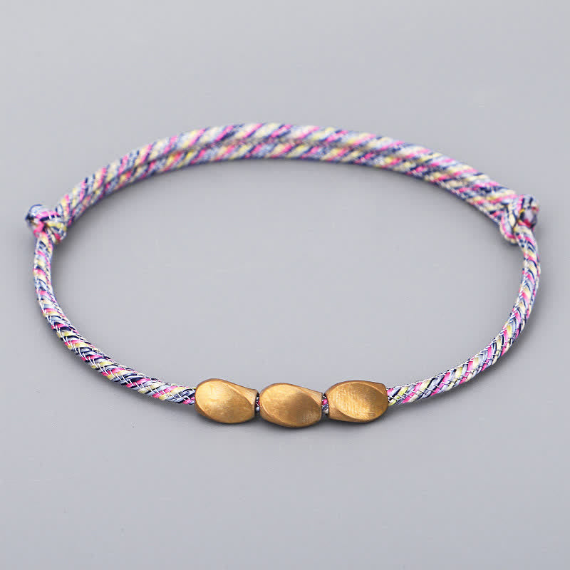 Buddha Stones Bracelet d'équilibre en perles de cuivre doré multicolores, composé de plusieurs cordons. - Rose clair - image 0