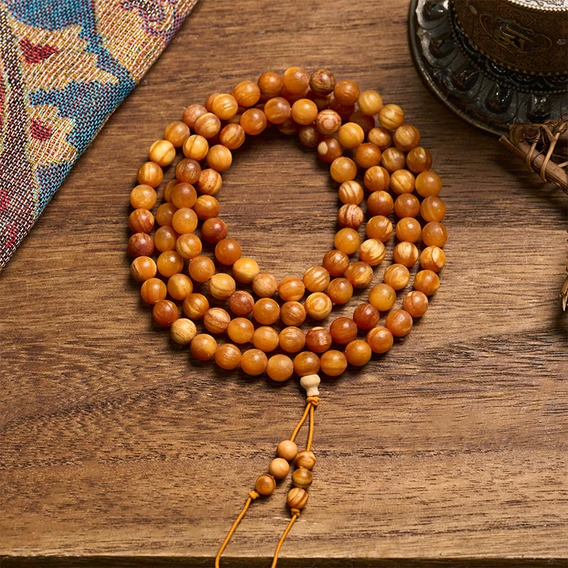 Buddha Stones Mala de 108 perles en bois de pin riche en résine, symbole d'énergie apaisante - 12 mm x 108 - image 0