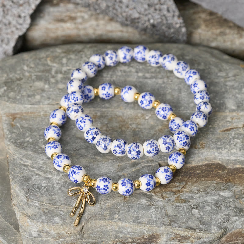 Buddha Stones Bracelet intérieur de la paix en porcelaine rose et blanche, orné d'un nœud papillon et de perles bleues et blanches - image 2