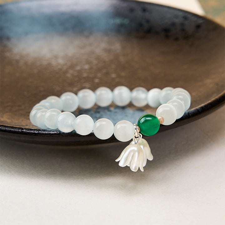 Buddha Stones Bracelet positif en perles rondes œil-de-chat blanches de 8 mm, motif muguet - image 3