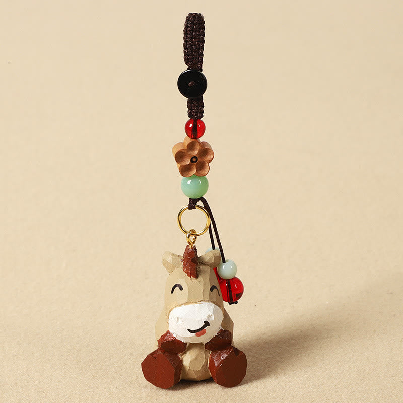 Buddha Stones Porte-clés en bois de tilleul gravé de fleurs de prunier, symbole de paix et de bien-être : Om Mani Padme Hum. - Cheval 4 cm (la couleur, la forme et la taille peuvent varier) - Fleur de prunier - image 1