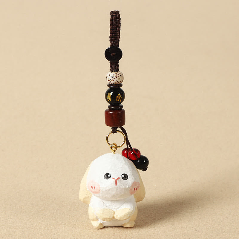 Buddha Stones Porte-clés en bois de tilleul gravé de fleurs de prunier, symbole de paix et de bien-être : Om Mani Padme Hum. - Lapin 4 cm (la couleur, la forme et la taille peuvent varier) - Om Mani Padme Hum - image 16