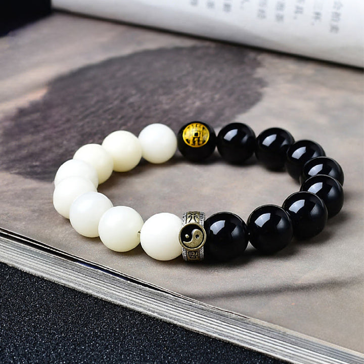 Buddha Stones Bracelet de force en obsidienne noire, graine de Bodhi, mantra Yin Yang à neuf caractères, fantômes de la montagne, dépenser de l'argent - Graine de Bodhi en obsidienne noire - 12 mm (Tour de poignet : 17-18 cm) - image 0