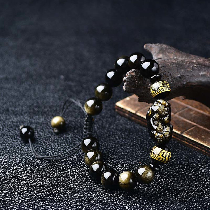 Buddha Stones Bracelet de protection PiXiu Om Mani Padme Hum en obsidienne à reflets dorés naturels - 10 mm (Tour de poignet : 16-17 cm) - image 0