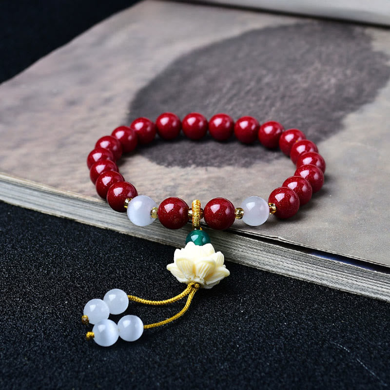 Buddha Stones Bracelet de bénédiction avec breloque lotus en ivoire œil de chat et cinabre naturel - 8 mm Cinabre (Tour de poignet : 15–16 cm) - image 0