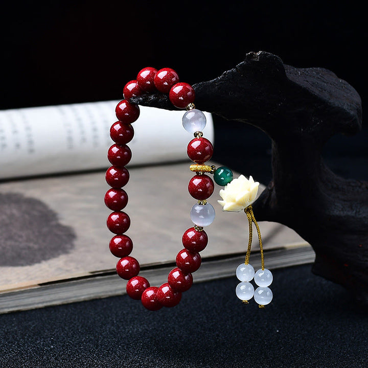 Buddha Stones Bracelet de bénédiction avec breloque lotus en ivoire œil de chat et cinabre naturel - image 1