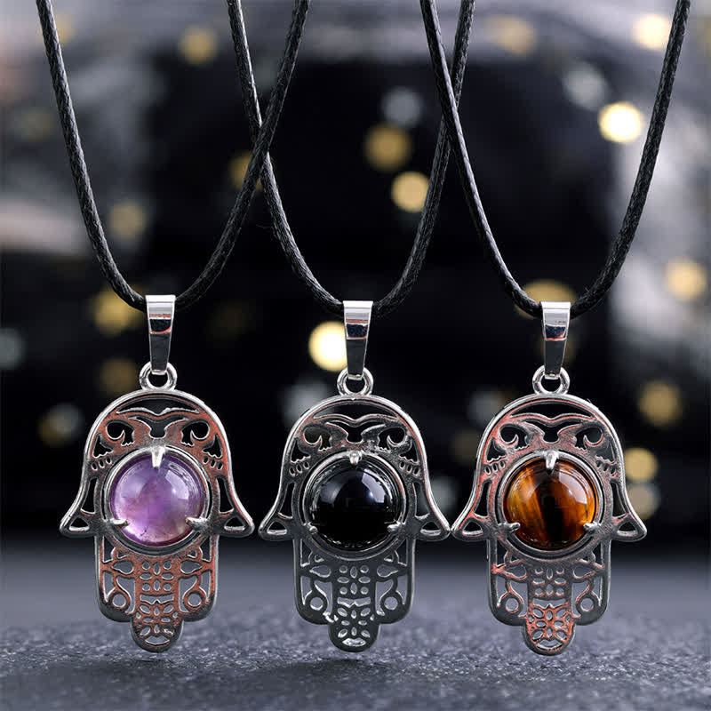 Buddha Stones Collier en obsidienne noire naturelle avec incrustation de palmier Hamsa et cristal de force - image 0