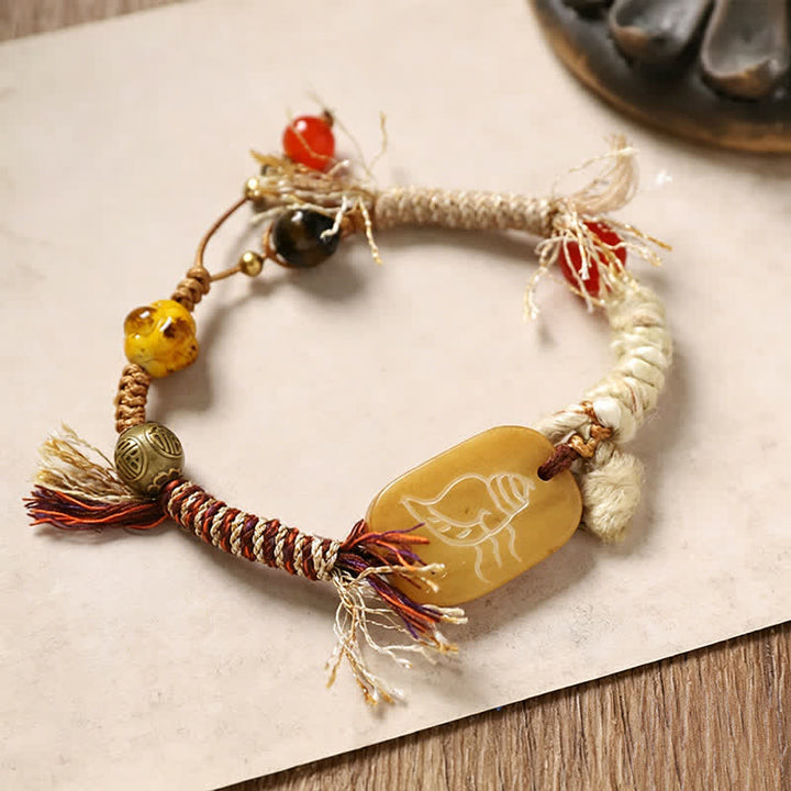 Buddha Stones Bracelet de paix en corde tressée avec le personnage Bone Fu - Os à motif conque (circonférence du poignet : 20-22 cm) - image 2