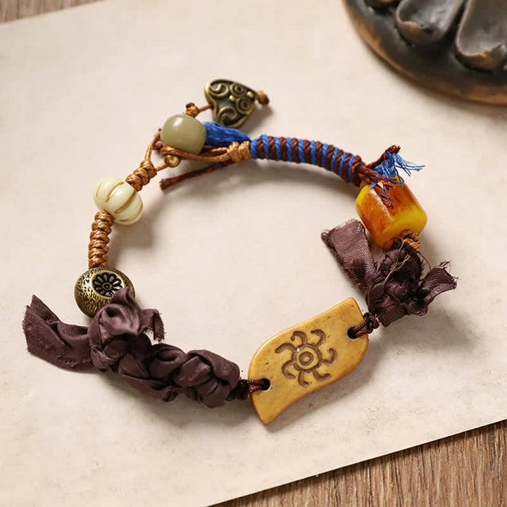 Buddha Stones Bracelet de paix en corde tressée avec le personnage Bone Fu - Os à motif soleil (Tour de poignet : 20-22 cm) - image 4