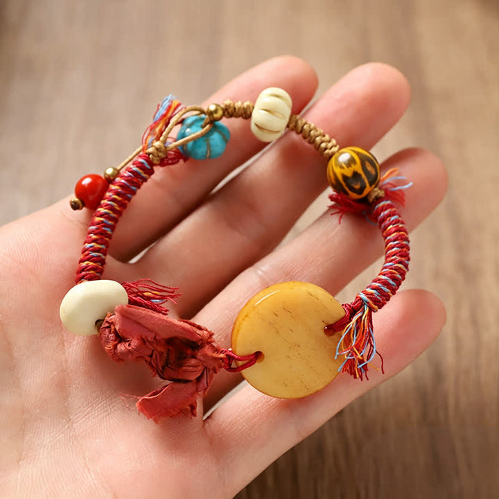 Buddha Stones Bracelet de paix en corde tressée avec le personnage Bone Fu - image 1