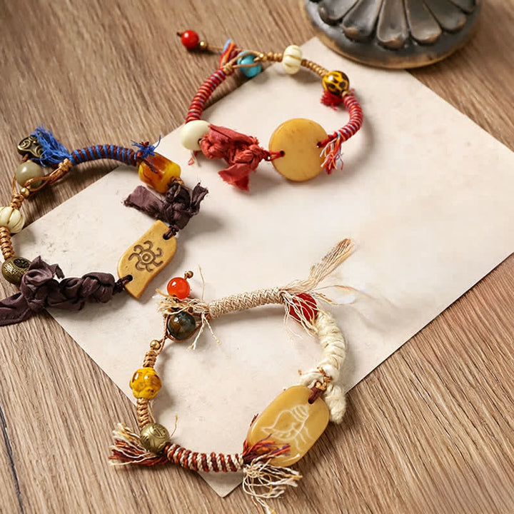 Buddha Stones Bracelet de paix en corde tressée avec le personnage Bone Fu - image 9