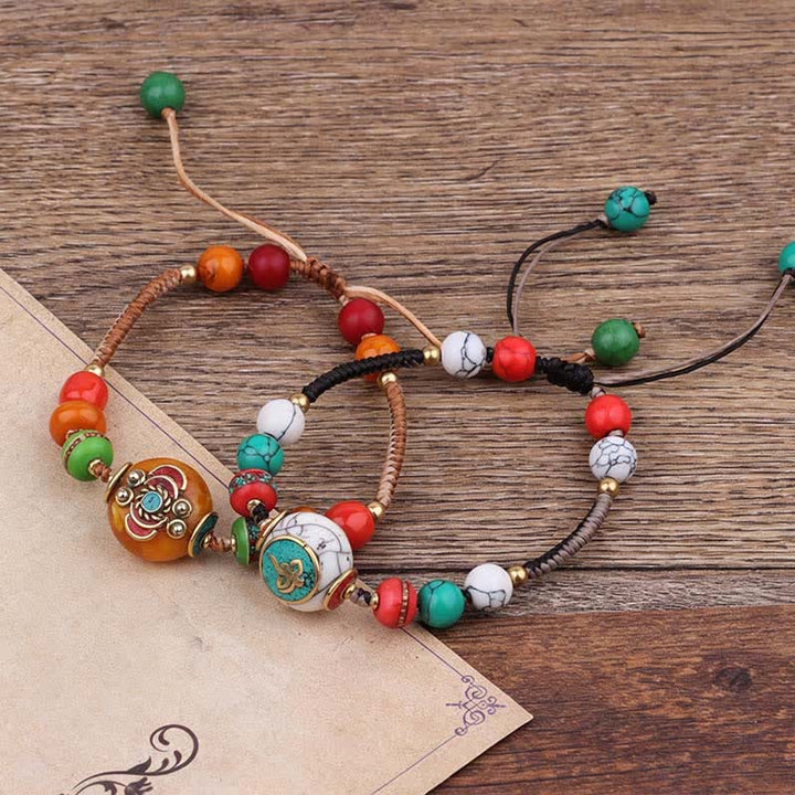 Buddha Stones Bracelet d'amour en corde tressée tibétaine turquoise et ambre - image 15