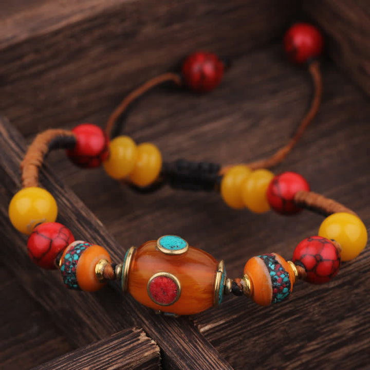 Buddha Stones Bracelet d'amour en corde tressée tibétaine turquoise et ambre - Cordon noir et orange (Tour de poignet : 15-21 cm) - image 5