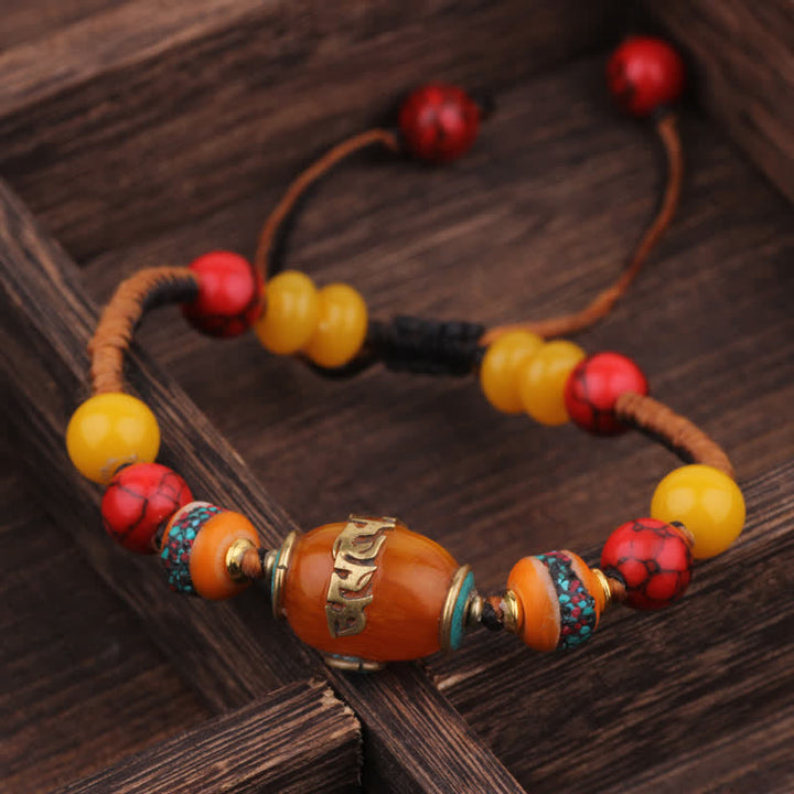 Buddha Stones Bracelet d'amour en corde tressée tibétaine turquoise et ambre - image 6