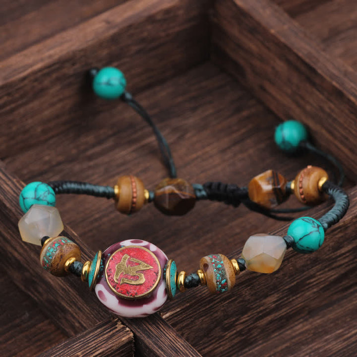 Buddha Stones Bracelet d'amour en corde tressée tibétaine turquoise et ambre - Cordon noir et bleu (Tour de poignet : 15-21 cm) - image 0