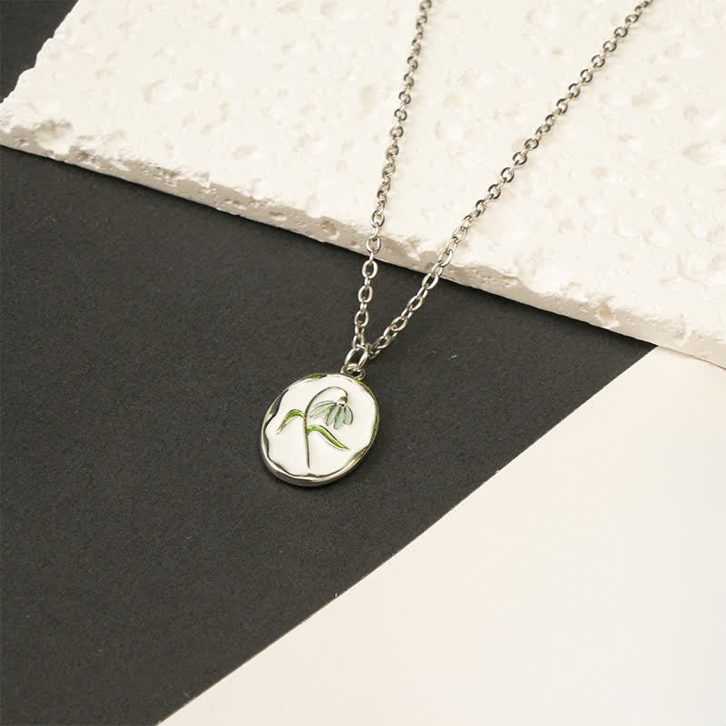 Buddha Stones Collier pendentif renforcé en acier titane avec fleur de naissance - Perce-neige - Acier titane argenté - image 2