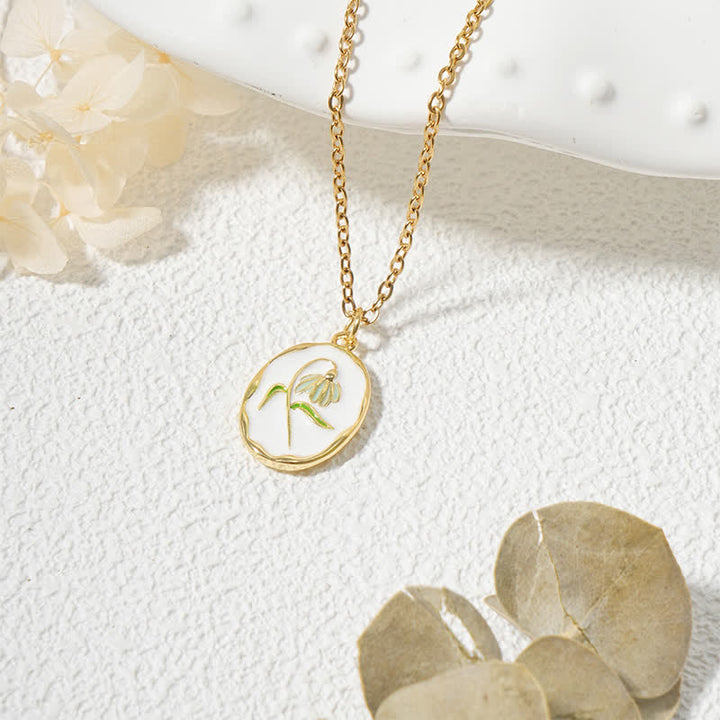 Buddha Stones Collier pendentif renforcé en acier titane avec fleur de naissance - Perce-neige - Acier au titane doré - image 1
