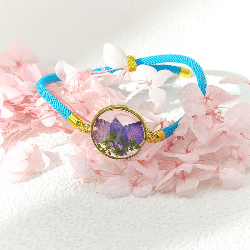 Buddha Stones Bracelet en résine fait main avec fleur de naissance et corde tressée ajustable - Pied-d'alouette (Tour de poignet : 17–22 cm) - image 9