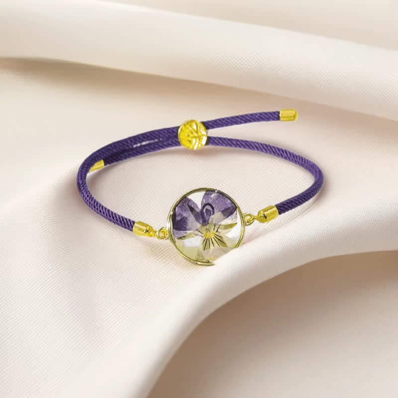 Buddha Stones Bracelet en résine fait main avec fleur de naissance et corde tressée ajustable - Violet (Tour de poignet : 17–22 cm) - image 0