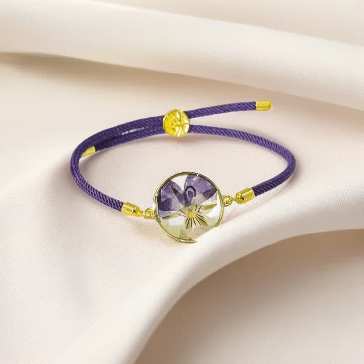 Buddha Stones Bracelet en résine fait main avec fleur de naissance et corde tressée ajustable - Violet (Tour de poignet : 17–22 cm) - image 0