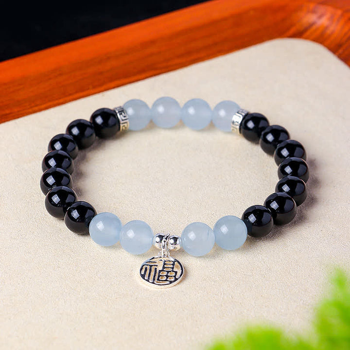 Buddha Stones Bracelet porte-bonheur en perles d'onyx noir représentant le personnage Fu - image 14