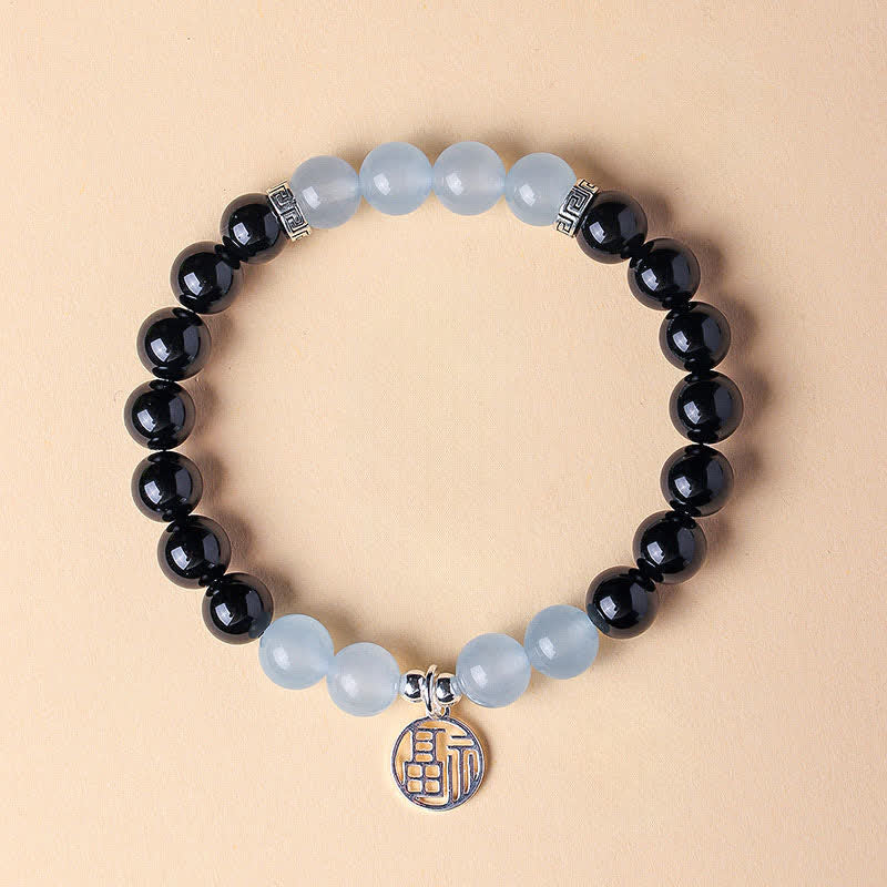 Buddha Stones Bracelet porte-bonheur en perles d'onyx noir représentant le personnage Fu - Onyx noir, calcédoine bleue (tour de poignet : 15–16 cm) - image 12