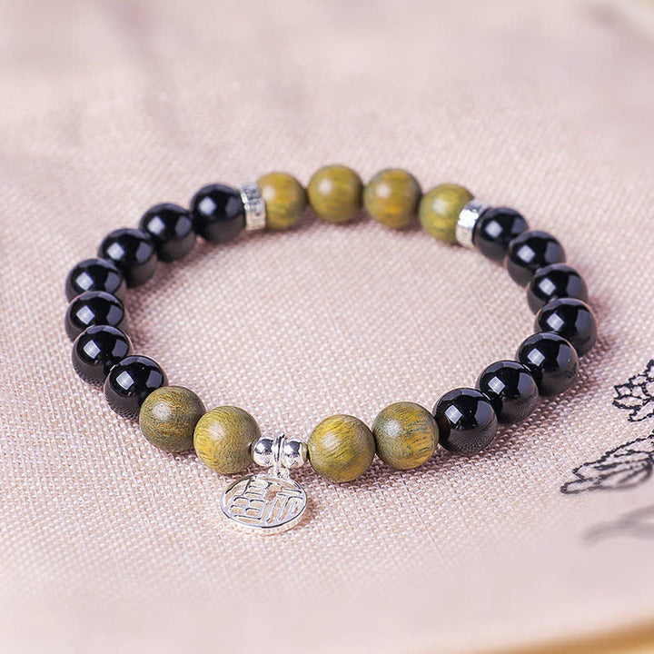 Buddha Stones Bracelet porte-bonheur en perles d'onyx noir représentant le personnage Fu - image 17