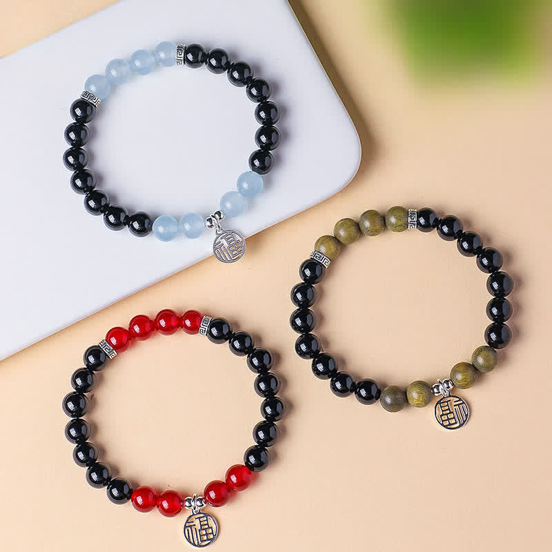 Buddha Stones Bracelet porte-bonheur en perles d'onyx noir représentant le personnage Fu - image 20