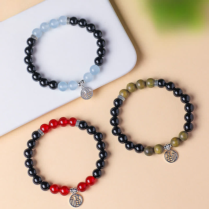 Buddha Stones Bracelet porte-bonheur en perles d'onyx noir représentant le personnage Fu - image 20