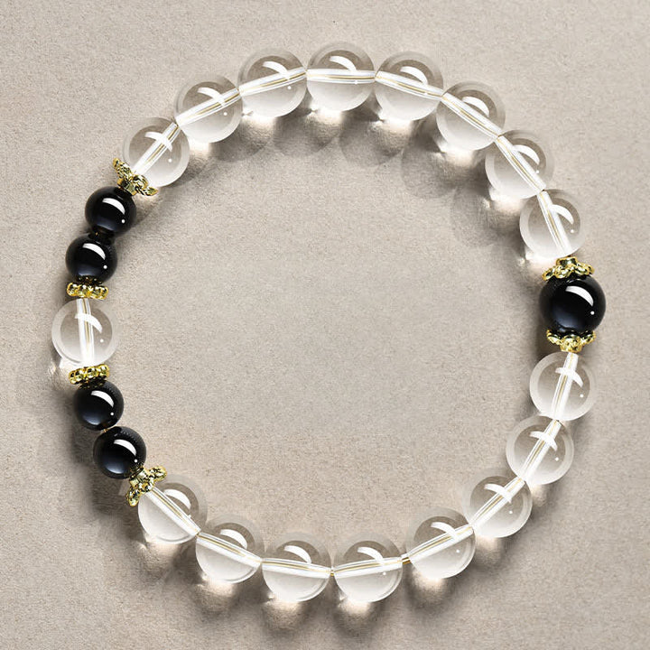 Buddha Stones Bracelet de guérison en perles de quartz clair naturel - Quartz clair 8 mm, obsidienne noire (tour de poignet : 15–16 cm) - image 0