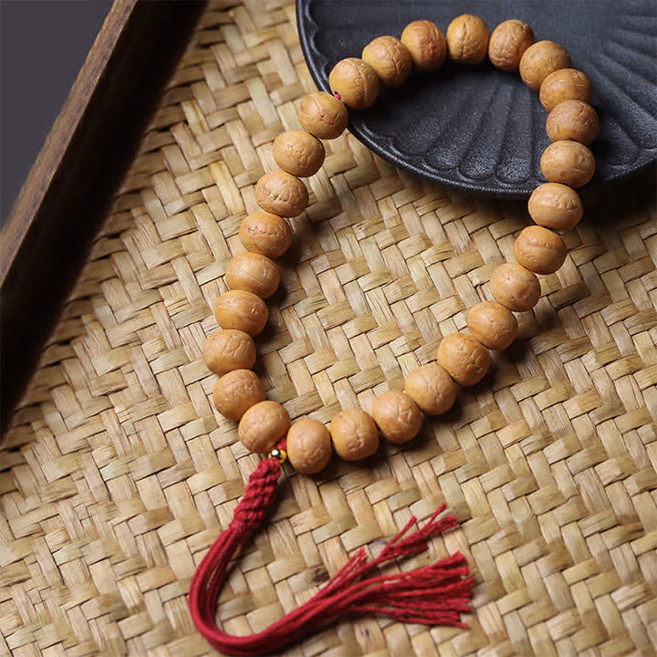Buddha Stones Mala de poignet tibétain à pompon gravé, orné de la sagesse de l'œil de phénix et de Bodhi - Œil de Phénix Bodhi (Protection ♥ Sagesse) - image 0