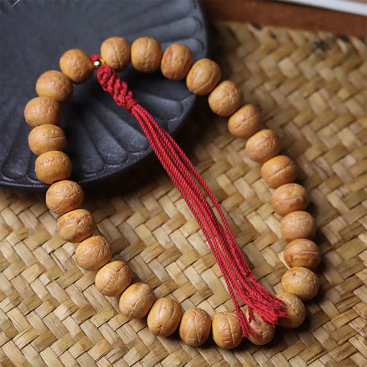 Buddha Stones Mala de poignet tibétain à pompon gravé, orné de la sagesse de l'œil de phénix et de Bodhi - image 1