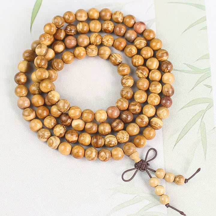 Buddha Stones Mala de 108 perles en bois de pêcher, poli à la main et noué, symbole de richesse - 8 mm - Motifs de grain anciens, artisanat moderne - Bois de pêcher (Protection♥Purification) - image 4