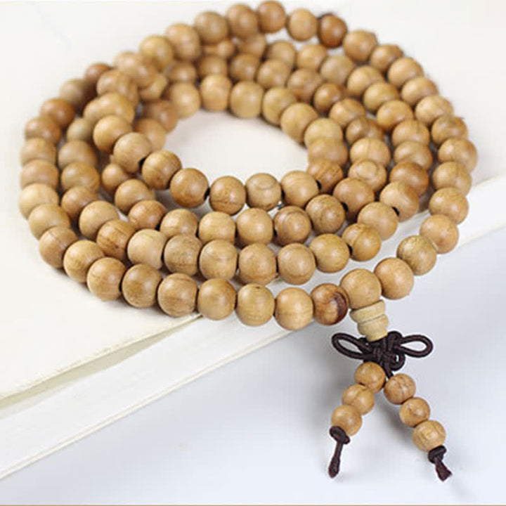 Buddha Stones Mala de 108 perles en bois de pêcher, poli à la main et noué, symbole de richesse - image 7