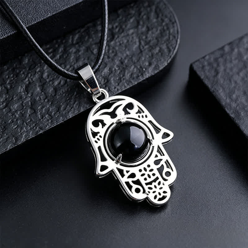 Buddha Stones Collier en obsidienne noire naturelle avec incrustation de palmier Hamsa et cristal de force - Obsidienne noire naturelle (la couleur peut varier) - image 1