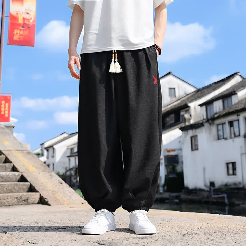 Buddha Stones Pantalon harem d'été pour homme, longueur cheville, à cordon de serrage, couleur unie, avec poches - Noir - US/UK/AU46，EU56 (5XL) - image 0