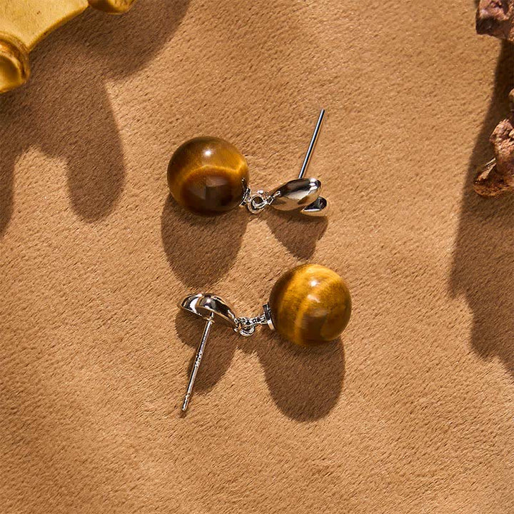 Buddha Stones Boucles d'oreilles en cuivre avec motif cœur œil de tigre et symbole du courage - image 4
