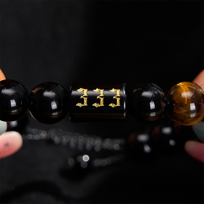 Buddha Stones Bracelet en œil de tigre en obsidienne noire naturelle avec numéro d'ange, symbole de force et d'accomplissement - image 1