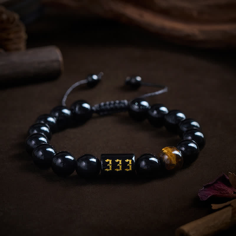 Buddha Stones Bracelet en œil de tigre en obsidienne noire naturelle avec numéro d'ange, symbole de force et d'accomplissement - 333 (Tour de poignet 15-19 cm) - image 0