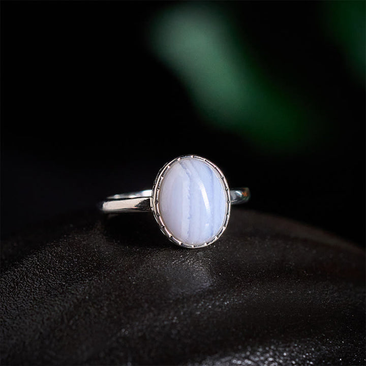 Buddha Stones Bague d'équilibre ronde en agate dentelle bleue naturelle - Agate dentelle bleue naturelle (la couleur peut varier) - US 7 (Réglable) - image 0